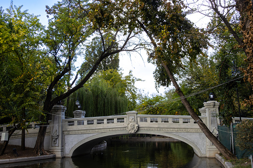 Bridge over the lake in Cismigiu garden, a famouis park in the center of Bucharest, Romania