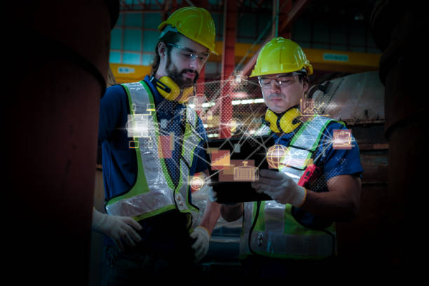 istock Team of engineers working at the factory 2123109569