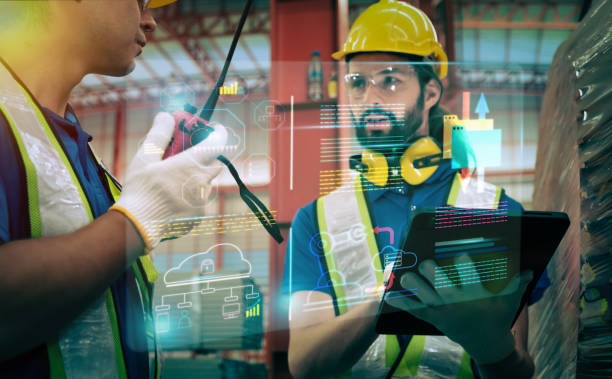 istock Team of engineers working at the factory 2123111151