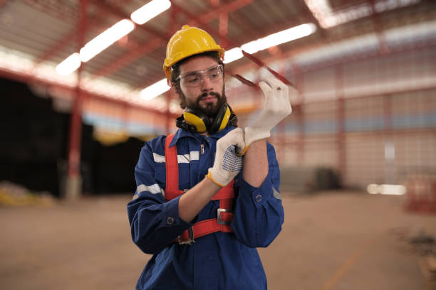 istock Team of engineers working at the factory 2123112735