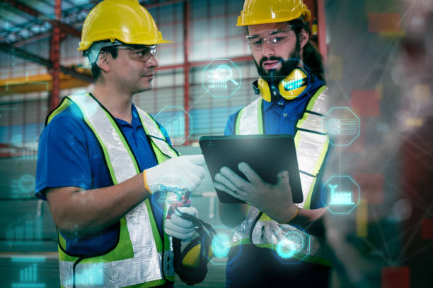 istock Team of engineers working at the factory 2123123407