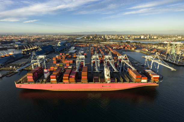 istock Aerial Shot of Container Ship in Port with Downtown Long Beach Beyond 2123124466