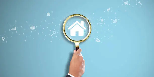 the complexities of texas probate law often create a labyrinth for executors and beneficiaries alike, businessman hand holding a magnifying glass with property icon on light blue background