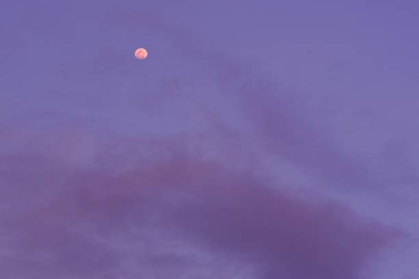 istock Colorful cloudscape, sunset with moon in central Florida 2123168843