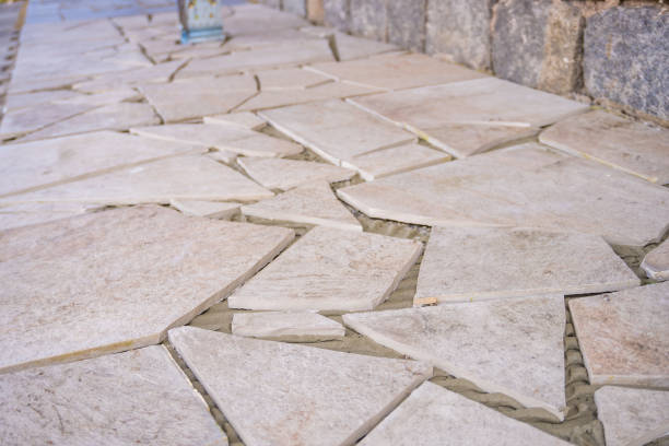istock Mosaic background. Gray abstract pattern handmade ceramic tiles on the floor 2123202625