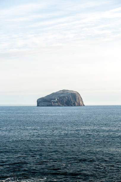 istock Stormy sea and island 2123263820