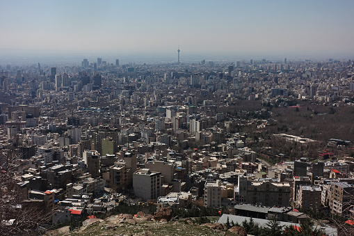 The cityscape of Tehran the capital city of Iran with the Milad Tower at the center