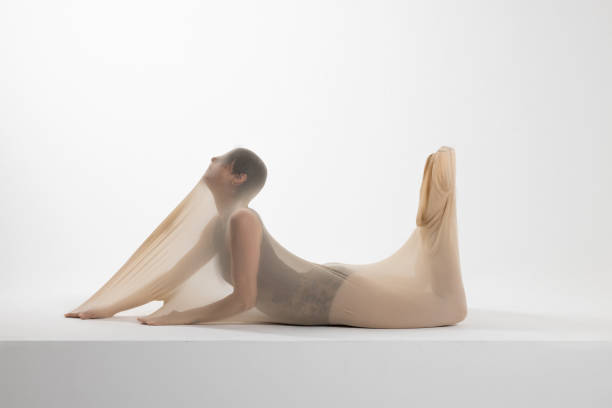 istock Beautiful ballerina is dancing with transparent socks 2123336360