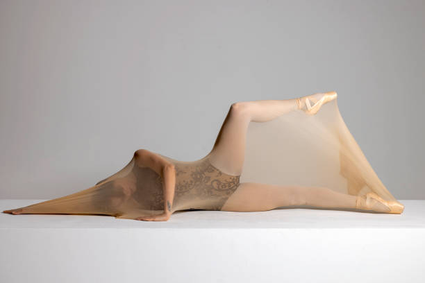 Beautiful ballerina is dancing with transparent socks