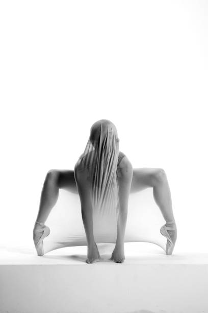 Beautiful ballerina is dancing with transparent socks