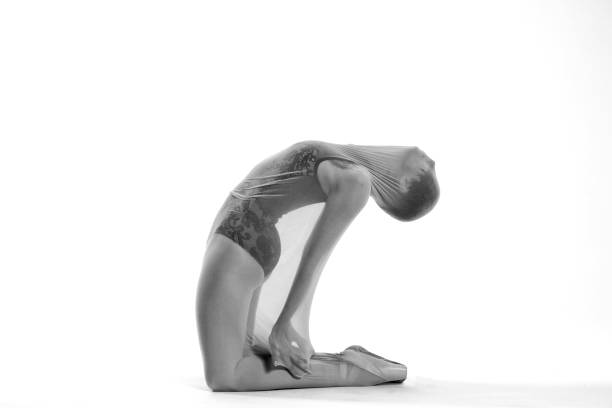 istock Beautiful ballerina is dancing with transparent socks 2123337922
