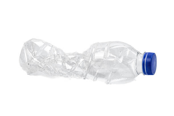 istock Crushed used plastic bottles isolated on white background. 2123364373