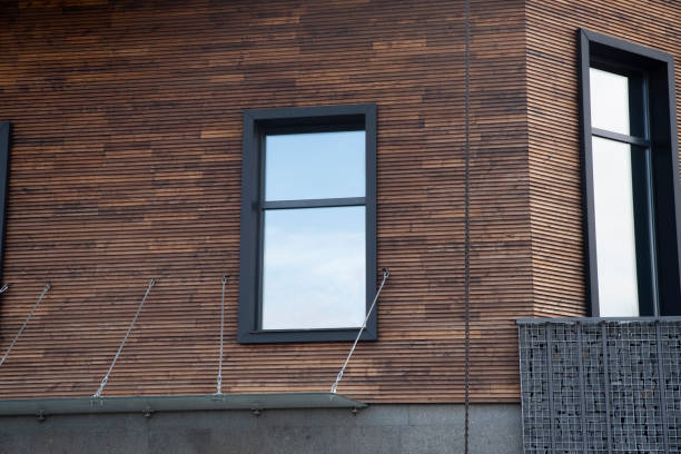 istock Modern building with wooden facade with black window 2123396552