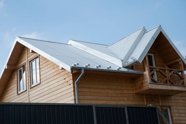 istock Wooden house with a light gray corrugated roof 2123397594