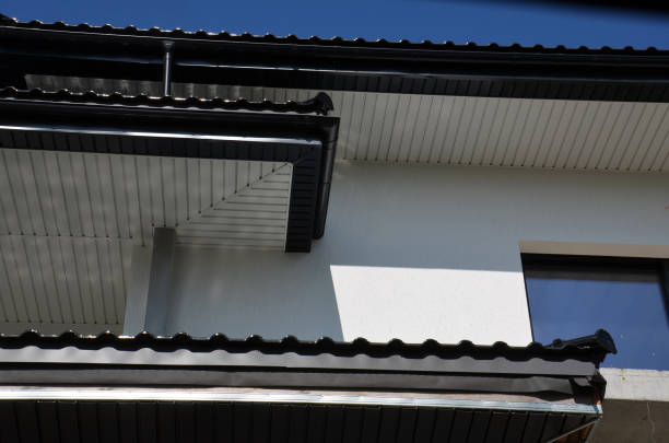 Downpipe.Draining water from the roof of the house.