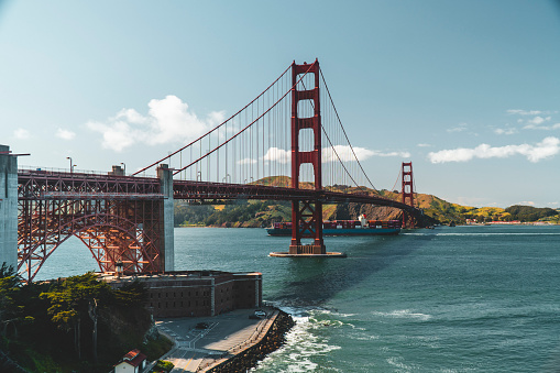 Freight Ship passing under the Golden Gate Bridge