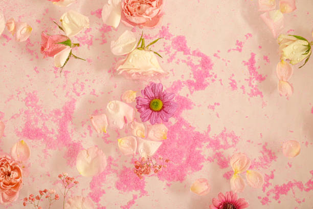 istock Flowers floating in the glittery water 2123601792