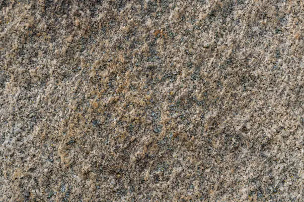 Photo of Rough texture of natural stone, granite rock
