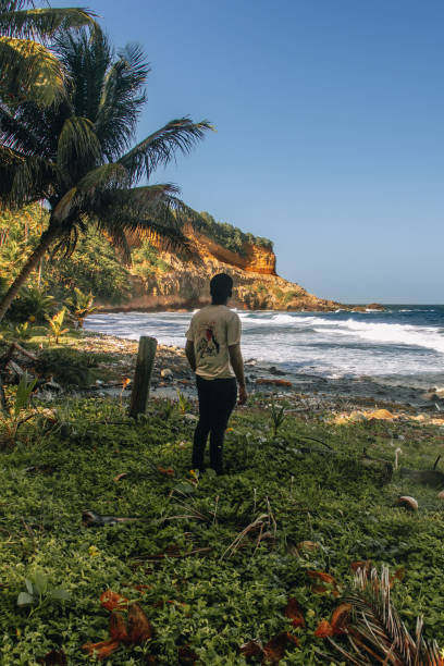 istock A man staring off into the distance at the beach 2123697383