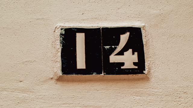 Number 14 (fourteen) Affixed to a Building
