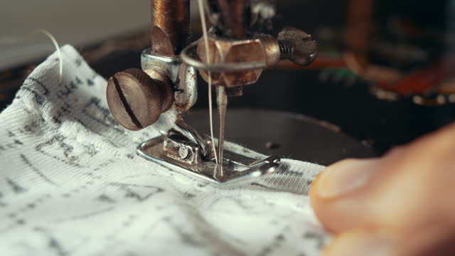 Working on vintage sewing machine
