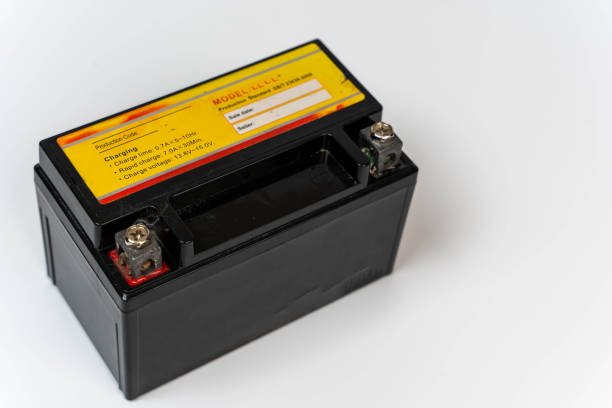 istock Small battery for moped or motorcycle on white background with copy space 2123817303