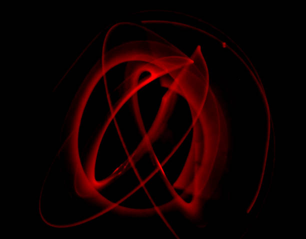 istock Red light painting, long exposure photography, ripples and round pattern 2123860776