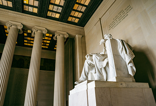 Washington DC  US  Mar 22, 2024 Large interior statue of Abraham Lincoln in the neoclassical Lincoln Memorial, a Doric styled columned temple, with a located on western end of the National Mall.
