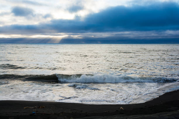 istock The sea at dusk with clouds 2123998088