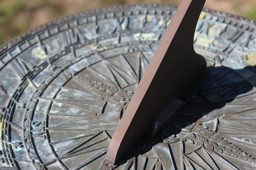 Old Sundial Close up With Shadow in Historic Cemetery located in East Texas