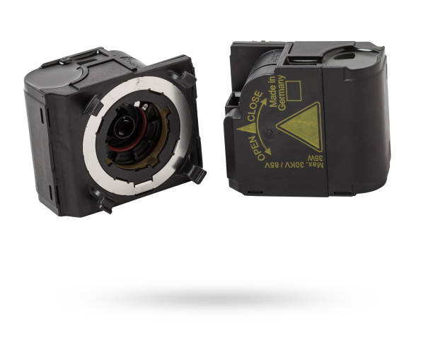 istock Spare part metall car engine control unit with metal elements on a white isolated background is the connecting center subsystems, units and assemblies. Rear view of the electronic xenon ignition unit 2124039644