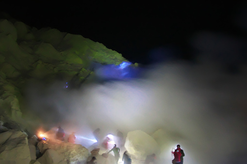 Ijen volcano, Indonesia - 04 Aug 2016: The blue fire in fog at night on Ijen volcano, Indonesia