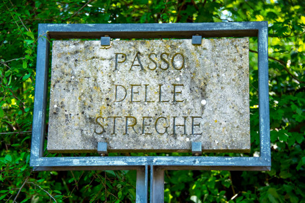 Detail of a street sign on a stone wall in the medieval village of Castell'Arquato, Piacenza, Emilia-Romagna, Italy