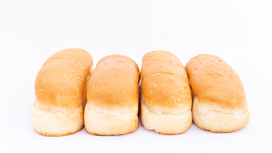Four bun breads on white background