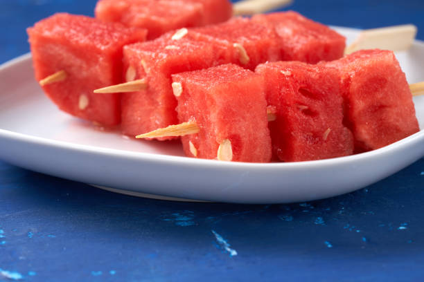 istock Finger food sticks with with watermelon cubes. 2124350243