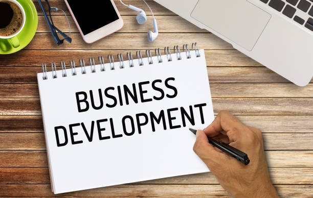 istock Business quotes, BUSINESS DEVELOPMENT on notebook or paper in office desk, office workplace, 2124423008