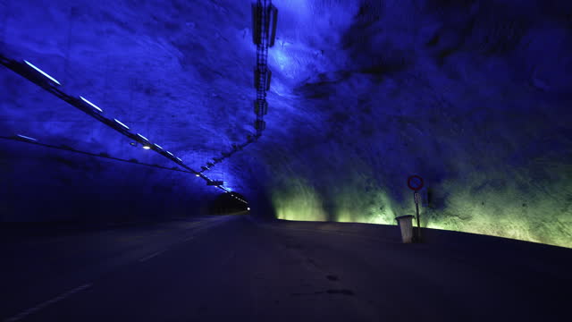 blue light of the interior of the underground Laerdal tunnel, the longest road tunnel on earth in Norway