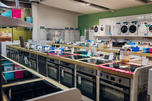 istock Washing machines and stoves in a home electronics store 2124491418