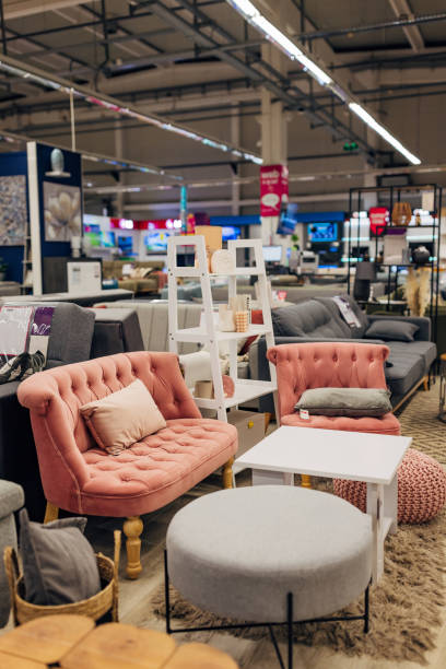 istock Comfortable living room sets displayed in a department store 2124498789