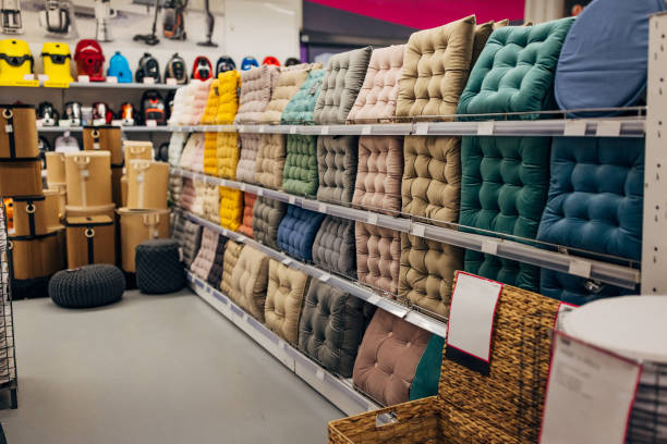 A variety of pillows on display in a department store