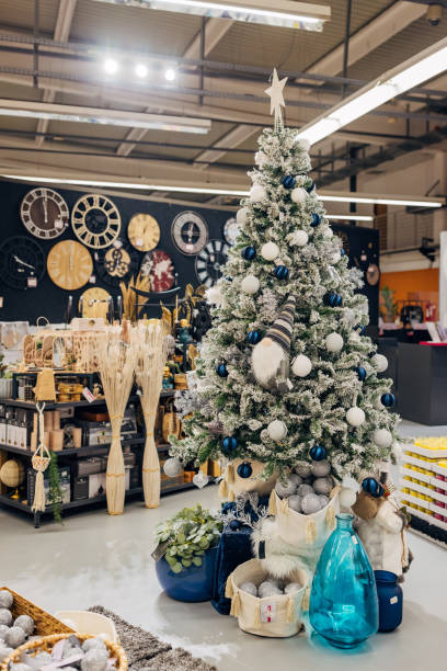 istock Christmas tree decorated with ornaments in a white-blue combination 2124504535