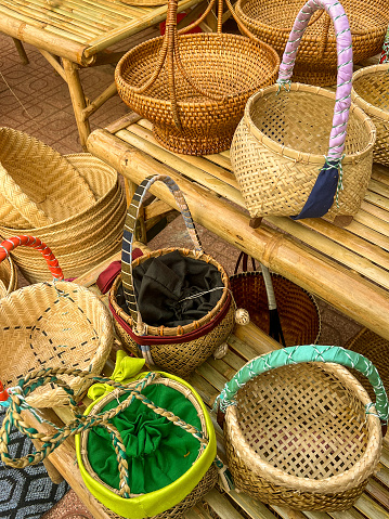 Handwoven colorful baskets are in display in a market place