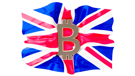 A striking image of the Bitcoin symbol superposed on the vibrant United Kingdom flag.