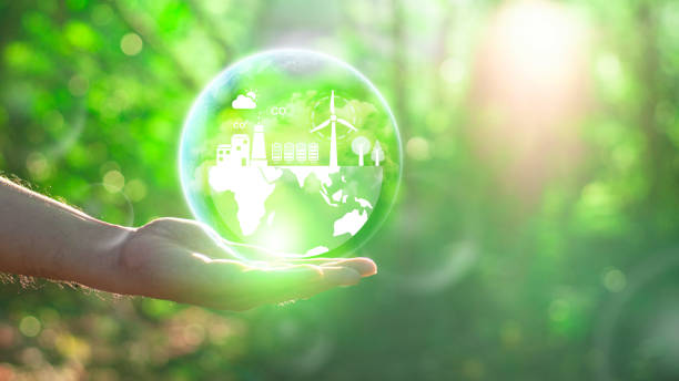 istock Reduce CO2 emission concept in the hand for environmental, global warming, Sustainable development and green business based on renewable energy.CO2 icon on green leaf with water droplet. 2124574686