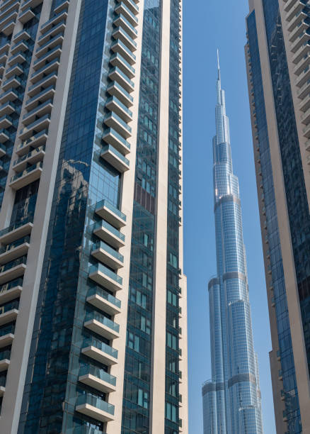 Discover the stunning high-rise skyscrapers of Dubai’s financial district, showcasing modern architecture and the vibrant economic hub of the city, a testament to its rapid growth and innovation.
