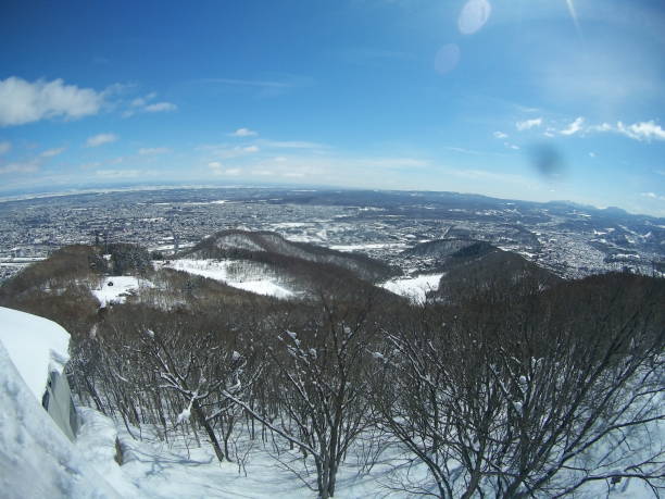 istock snowy landscape from mountain Moiwa, Sapporo, Japan 2124696504