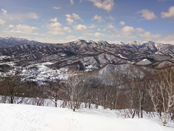 istock snowy landscape from mountain Moiwa, Sapporo, Japan 2124697553