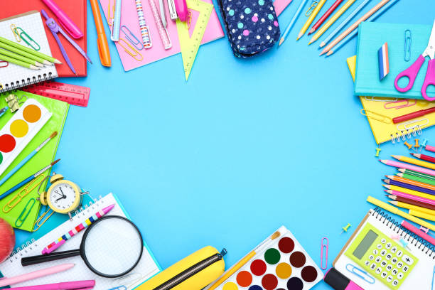istock Different school supplies on blue background 2124743520