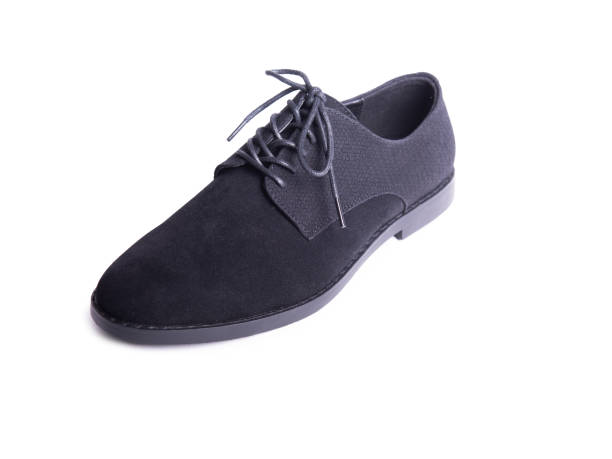 istock Right man's black shoe isolated on white background 2124791012