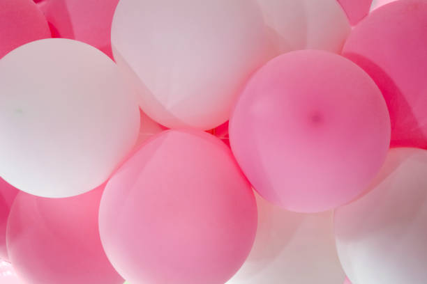 istock Pink and white balloons close-up for background, backing 2124801546